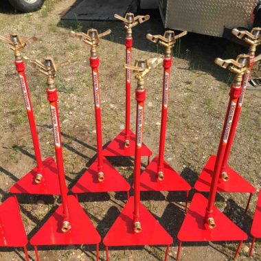 Group of 31-inch tall heavy-duty step-spike wildfire sprinklers